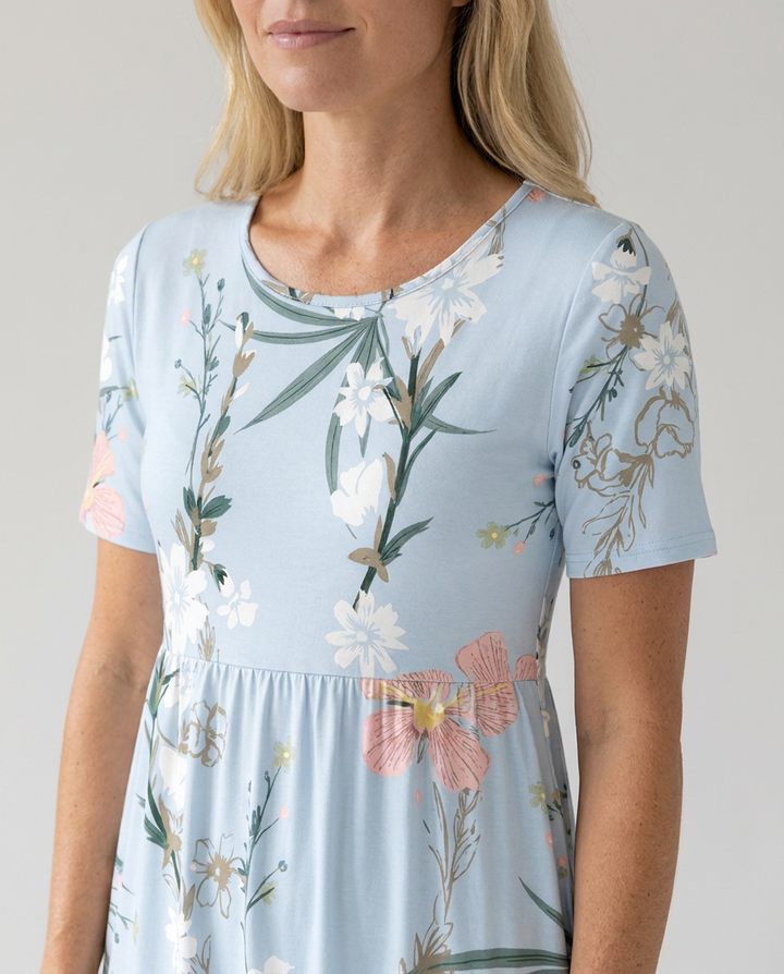 Fresh floral A-line midi dress for women. Round neck, short sleeves, great for casual or elegant summer events.