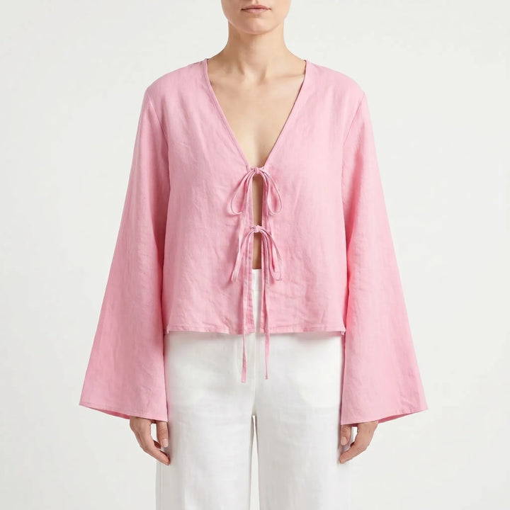 Casual women's tie front blouse, perfect for summer. Lightweight fabric ensures breezy comfort & style.