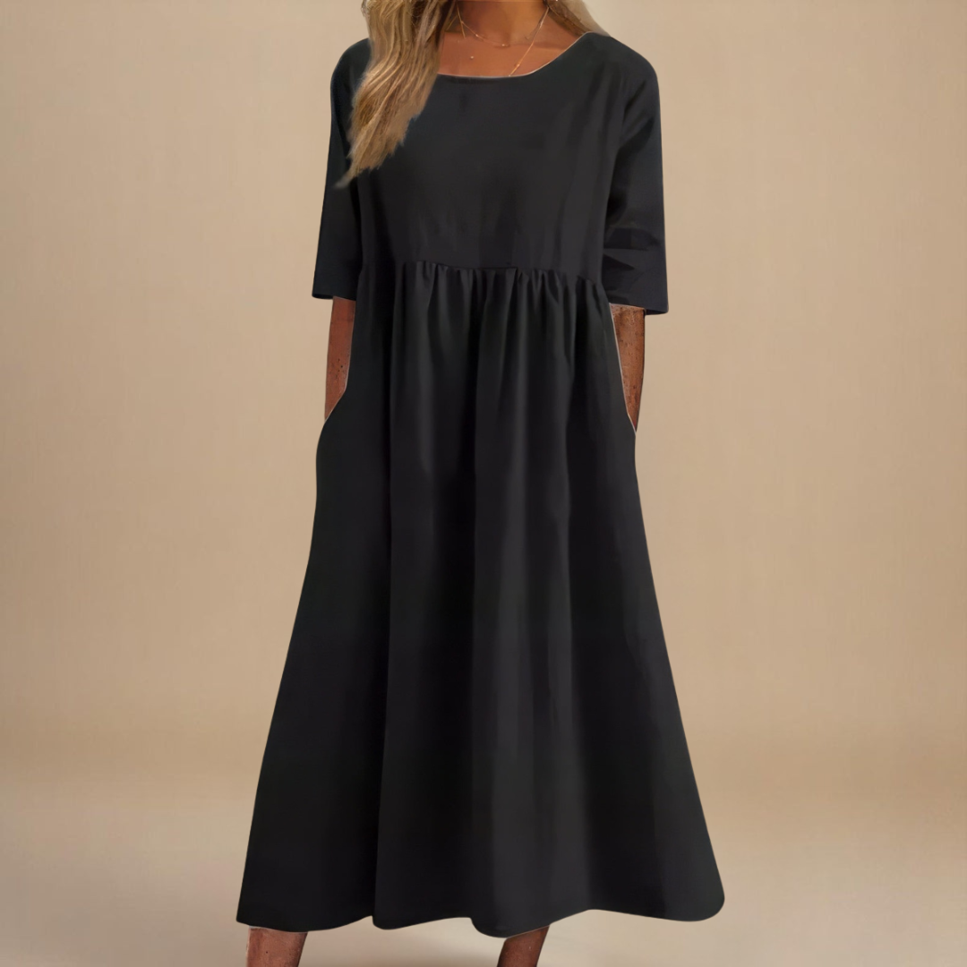 Versatile women's casual midi dress with half sleeves, gathered waist, and pockets, suitable for summer.