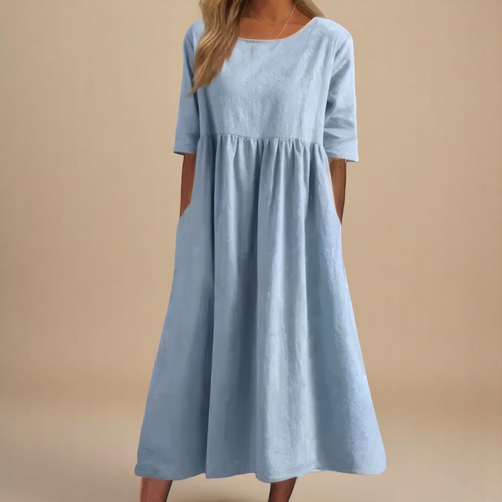 Everyday women's summer midi dress, half-sleeve, gathered waist, comfortable and stylish for any activity.