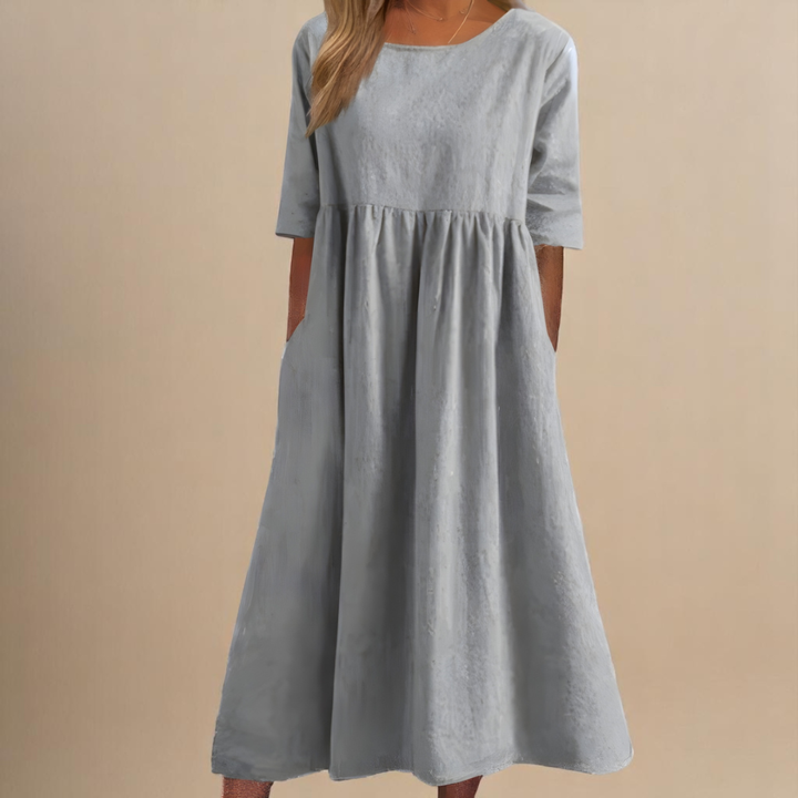 Flattering gathered waist midi dress for women, half-sleeve, scoop neck, perfect for a chic summer look.