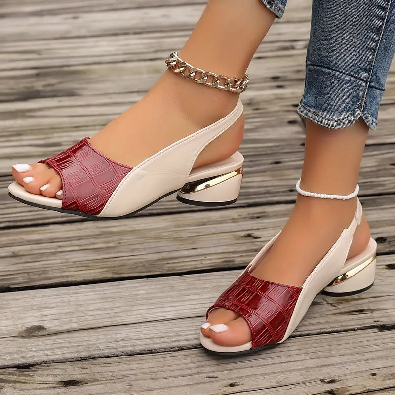 Chic women's open-toe leather sandals with a supportive cushioned footbed, ideal for versatile everyday wear.