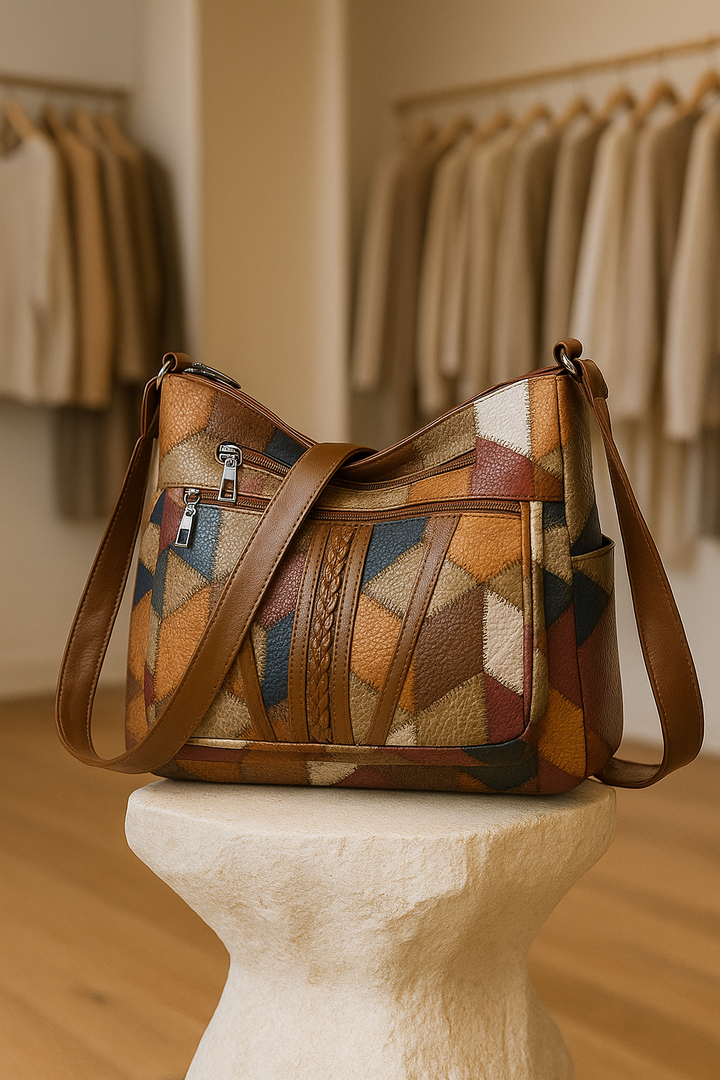 Women's geometric patchwork vegan leather handbag, perfect for daily essentials and stylish looks.