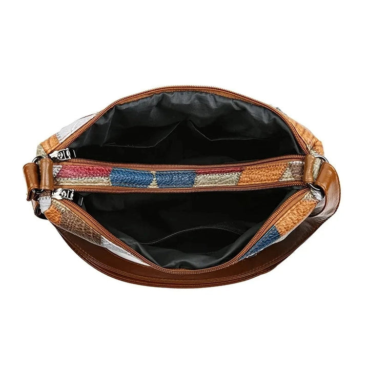 Women's stylish geometric patchwork vegan leather handbag, perfect for office or weekend wear.