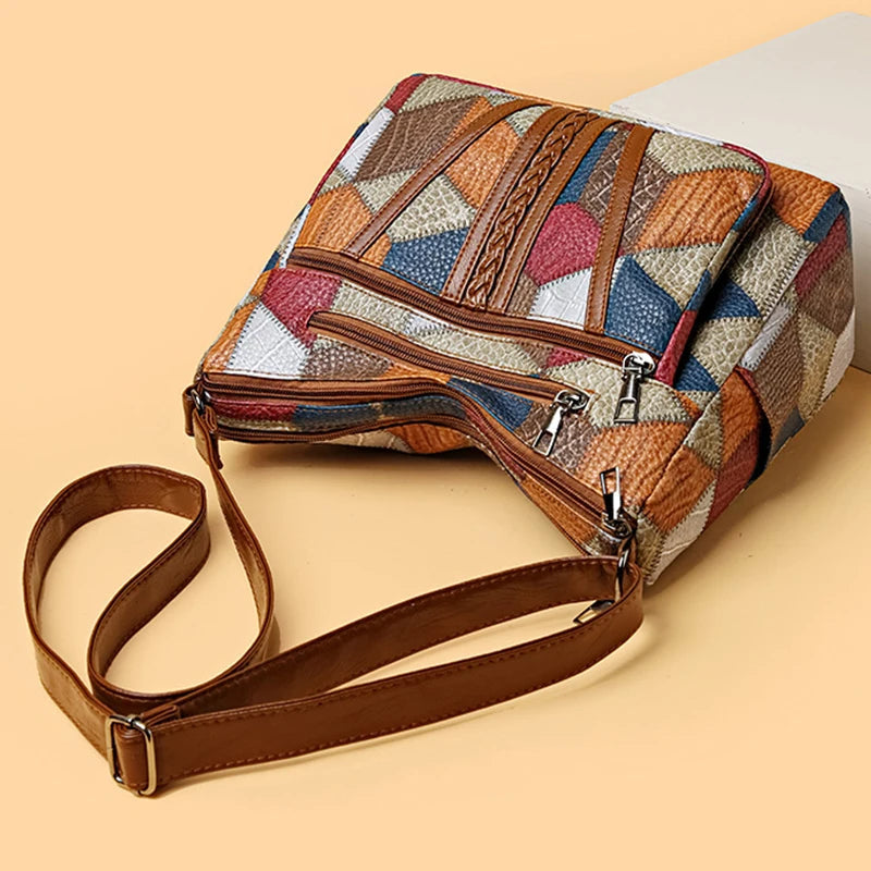 Close-up of a women's geometric patchwork vegan leather handbag, showcasing its unique design.
