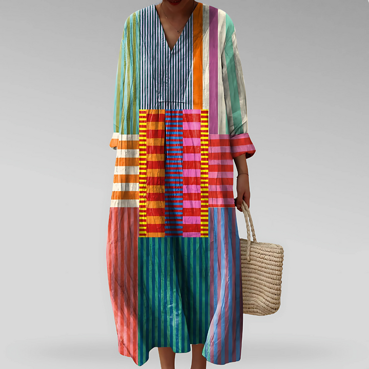 Women's geometric print maxi caftan dress with long sleeves, v-neck, and relaxed fit. Perfect for bohemian style.