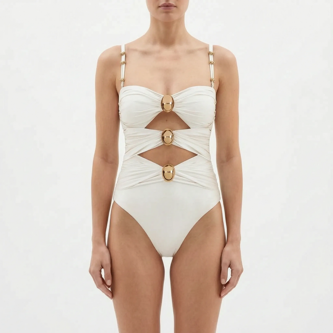 Glamorous women's cutout one-piece for a chic beach look; perfect resort and vacation wear.