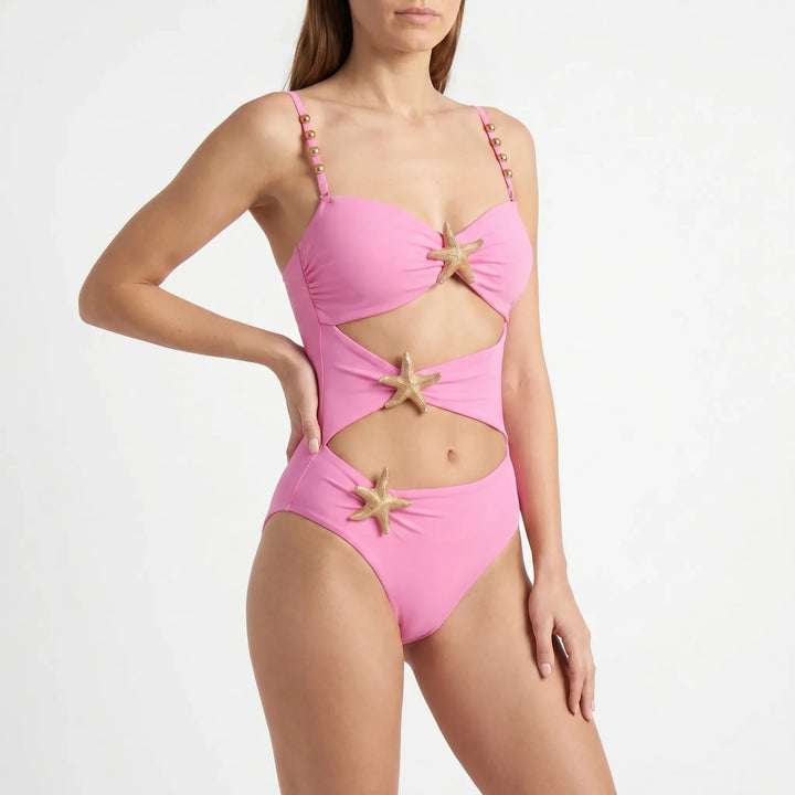 Elegant women's one-piece swimsuit with flattering cutouts and luxurious feel for resort.