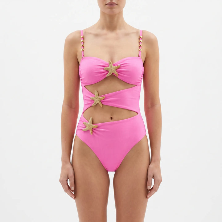 Chic women's monokini with alluring cutouts, perfect for a stylish resort or beach vacation.