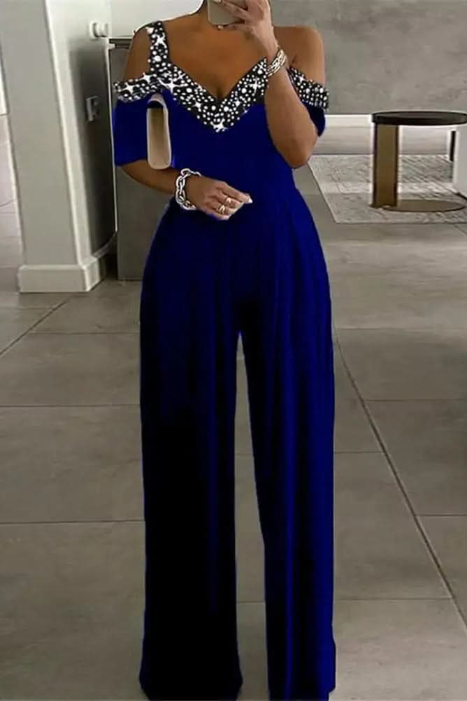 Glam women's rhinestone jumpsuit, a sparkling one-piece for elegant evening parties & special occasions. Formal wear.