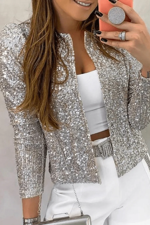 Dazzling women's sequin blazer, open front design. Ideal statement fashion piece for evening wear & events.