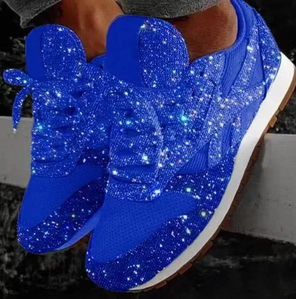 Comfortable women's glitter lace-up sneakers. Perfect everyday fashion footwear for a sparkling casual look.