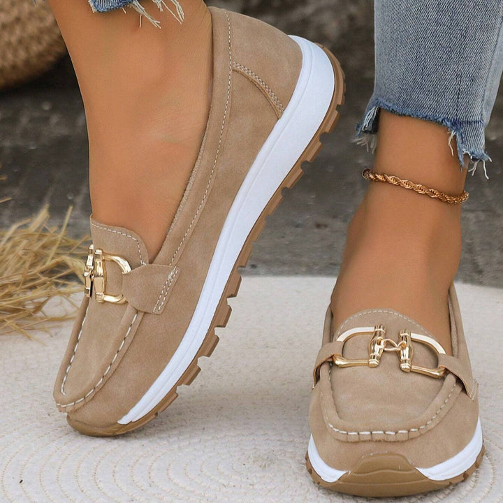 Women's gold buckle comfort loafers, perfect slip-on flats for everyday casual and smart casual wear.