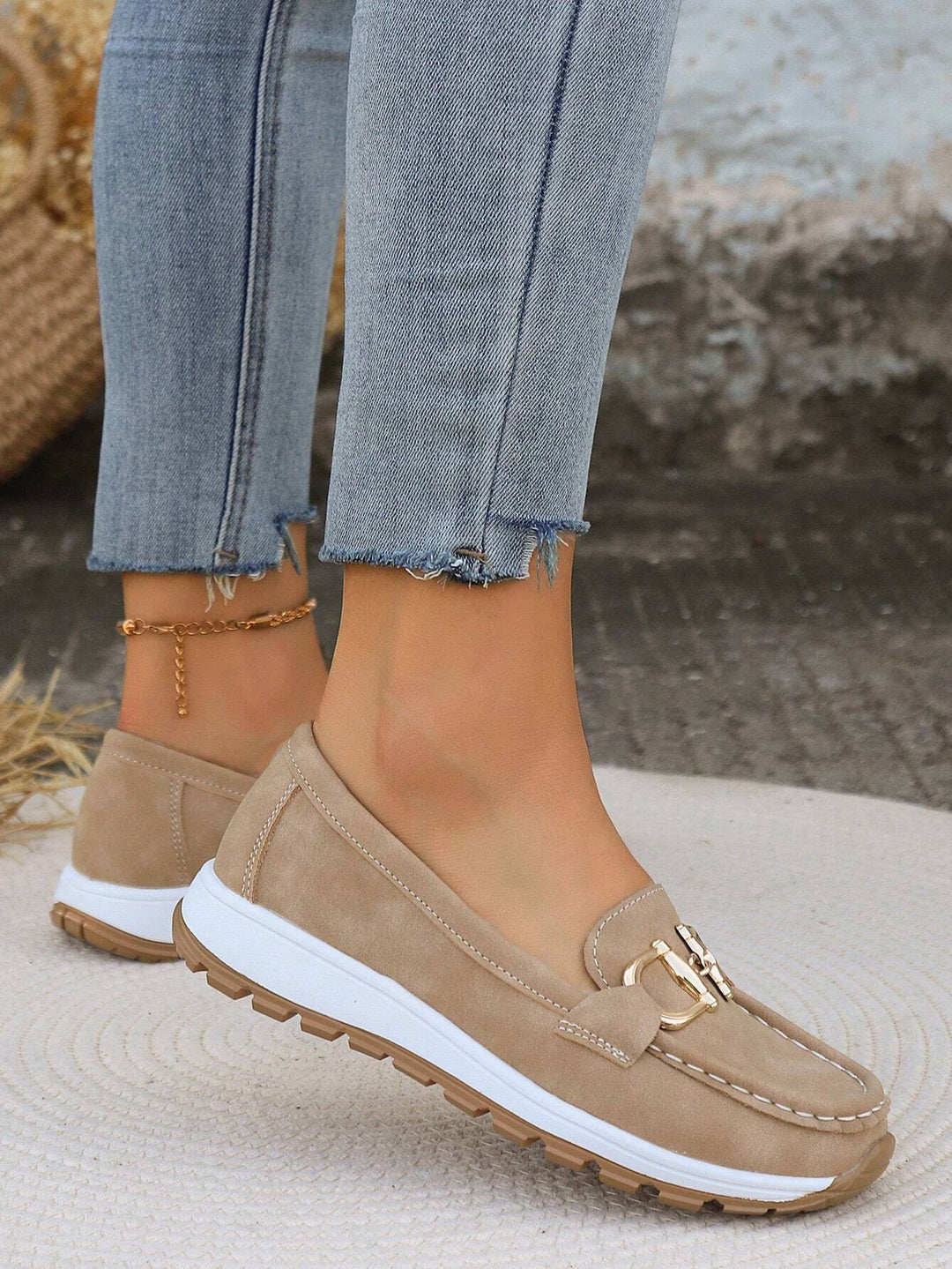 Versatile women's gold buckle loafers. Comfortable slip-on flats, great for casual, work, or smart casual outfits.