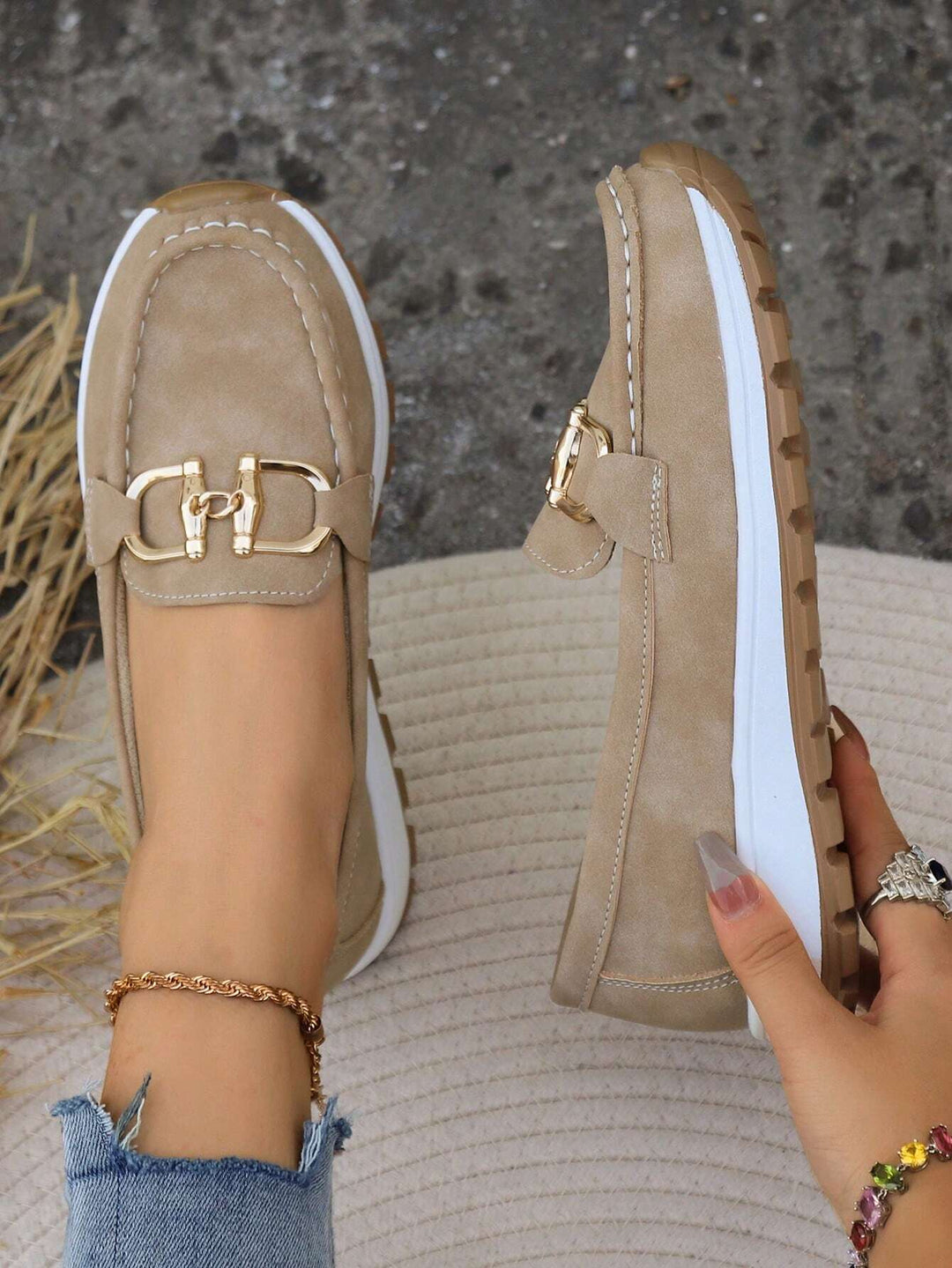 Chic women's gold buckle comfort loafers. Easy slip-on style, perfect everyday footwear for fashion-forward women.