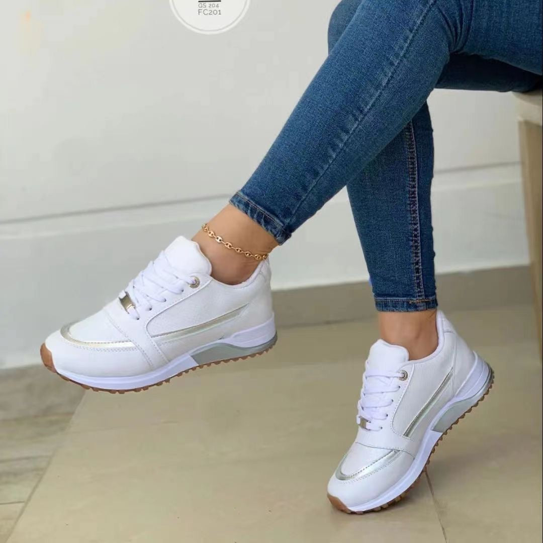 Stylish women's casual platform shoes featuring chic gold trim and secure lace-up closure.
