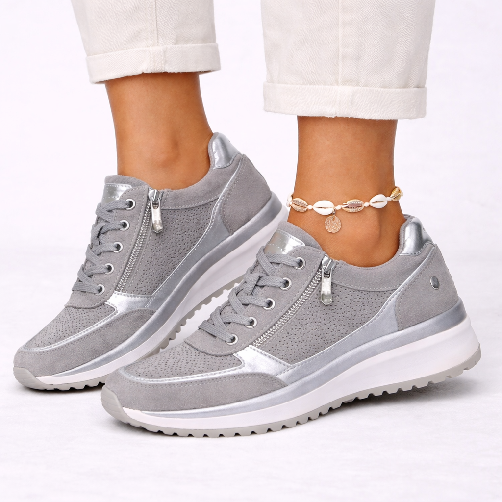 Women's gray orthopedic wedge sneakers, offering all-day comfort & support. Lightweight fashion footwear for casual wear.