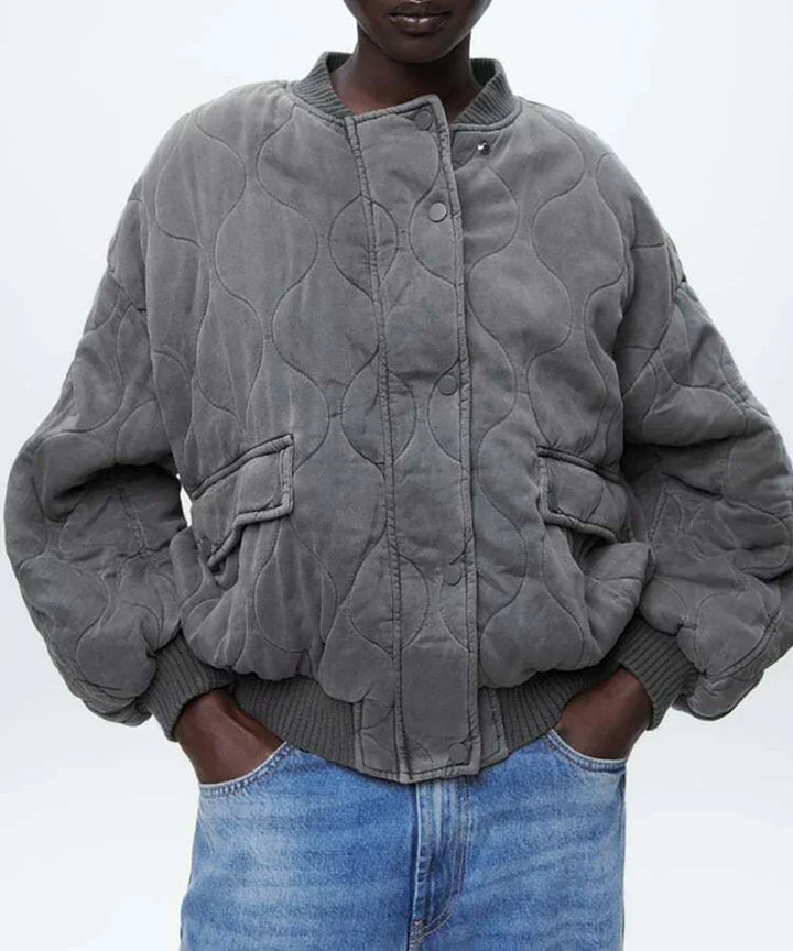 Stylish gray quilted bomber jacket for women, offering everyday comfort & a trendy look for fall.