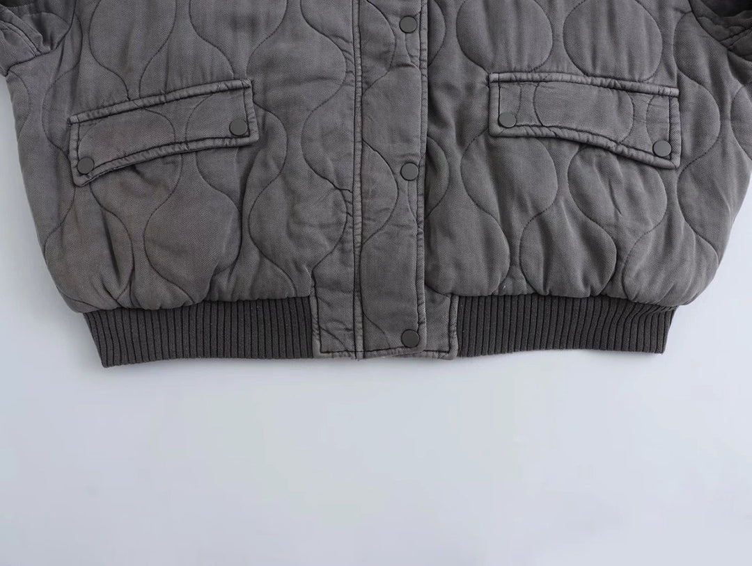 Warm women's gray quilted bomber jacket, an essential fall fashion & winter coat for everyday style.