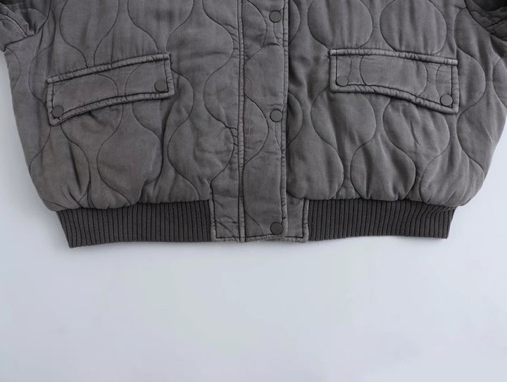 Warm women's gray quilted bomber jacket, an essential fall fashion & winter coat for everyday style.