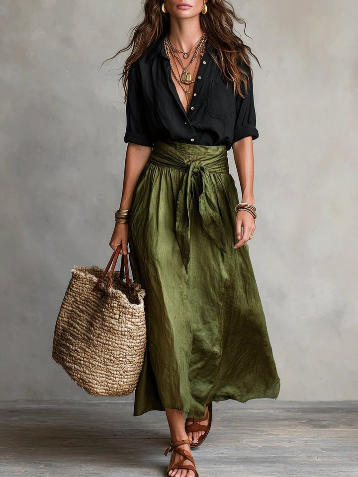 Women's green two-piece maxi skirt set with button-front shirt & tie waist, perfect for resort or summer vacation.