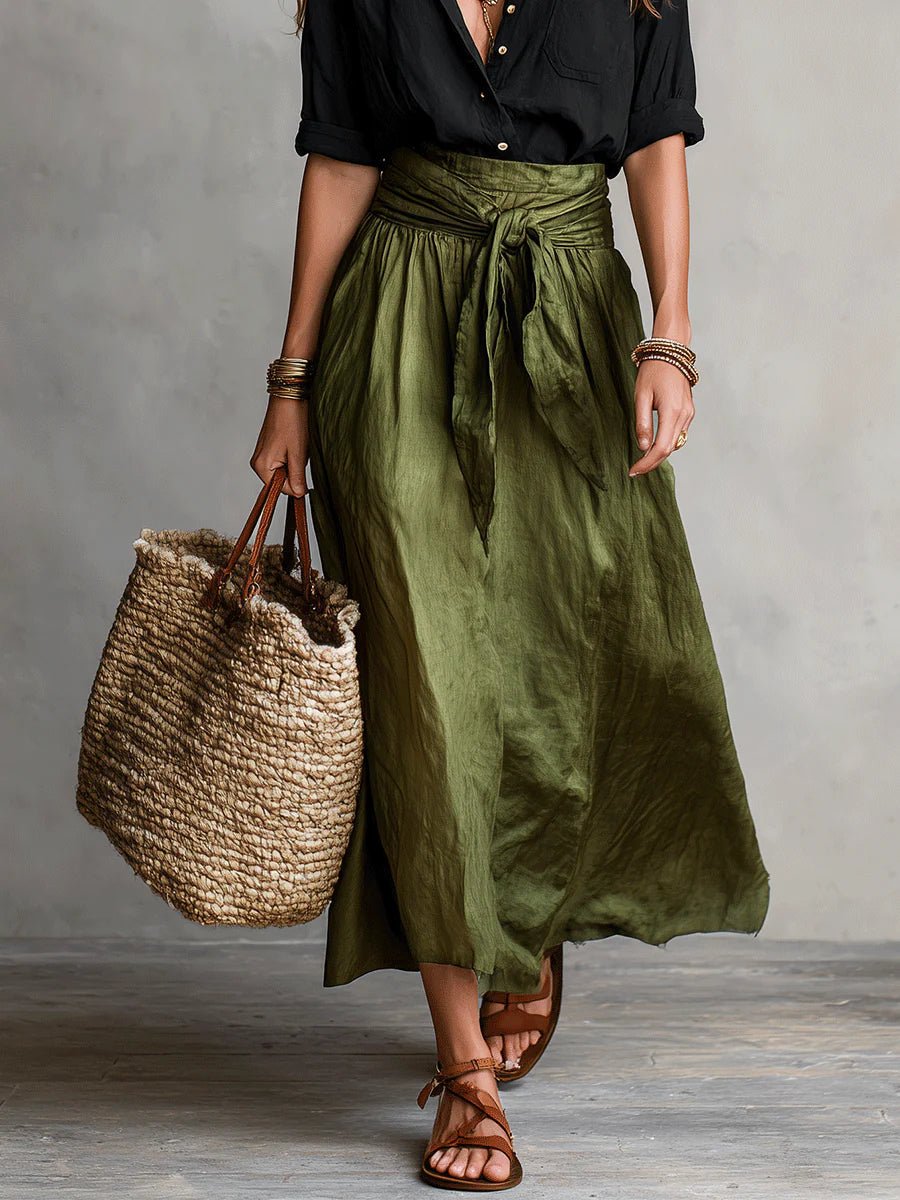 Stylish green summer women's maxi skirt set with a button-front top, tie waist, and relaxed fit skirt.