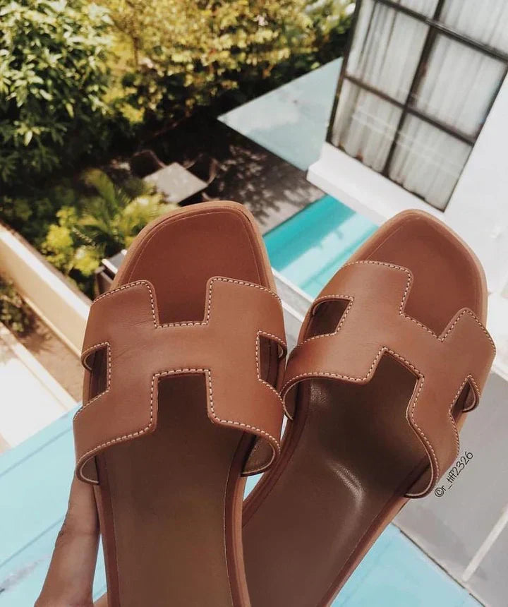 Chic women's H-Strap low heel slip-on sandals. Easy wear open-toe design for ultimate summer comfort.