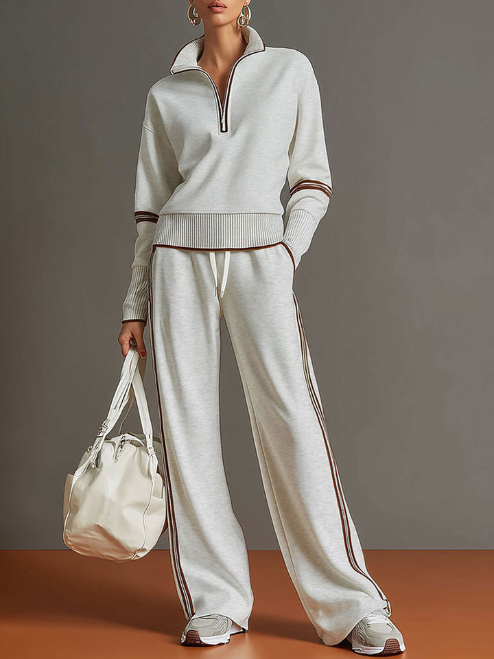 Women's half-zip sweatshirt & wide-leg trouser co-ord set, comfortable and stylish for casual wear.