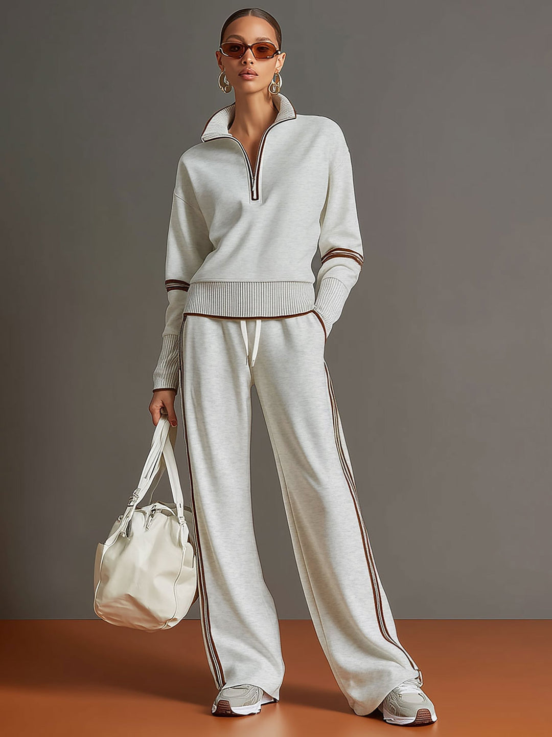 Extremely comfortable women's matching set with a half-zip top and relaxed wide-leg pants.