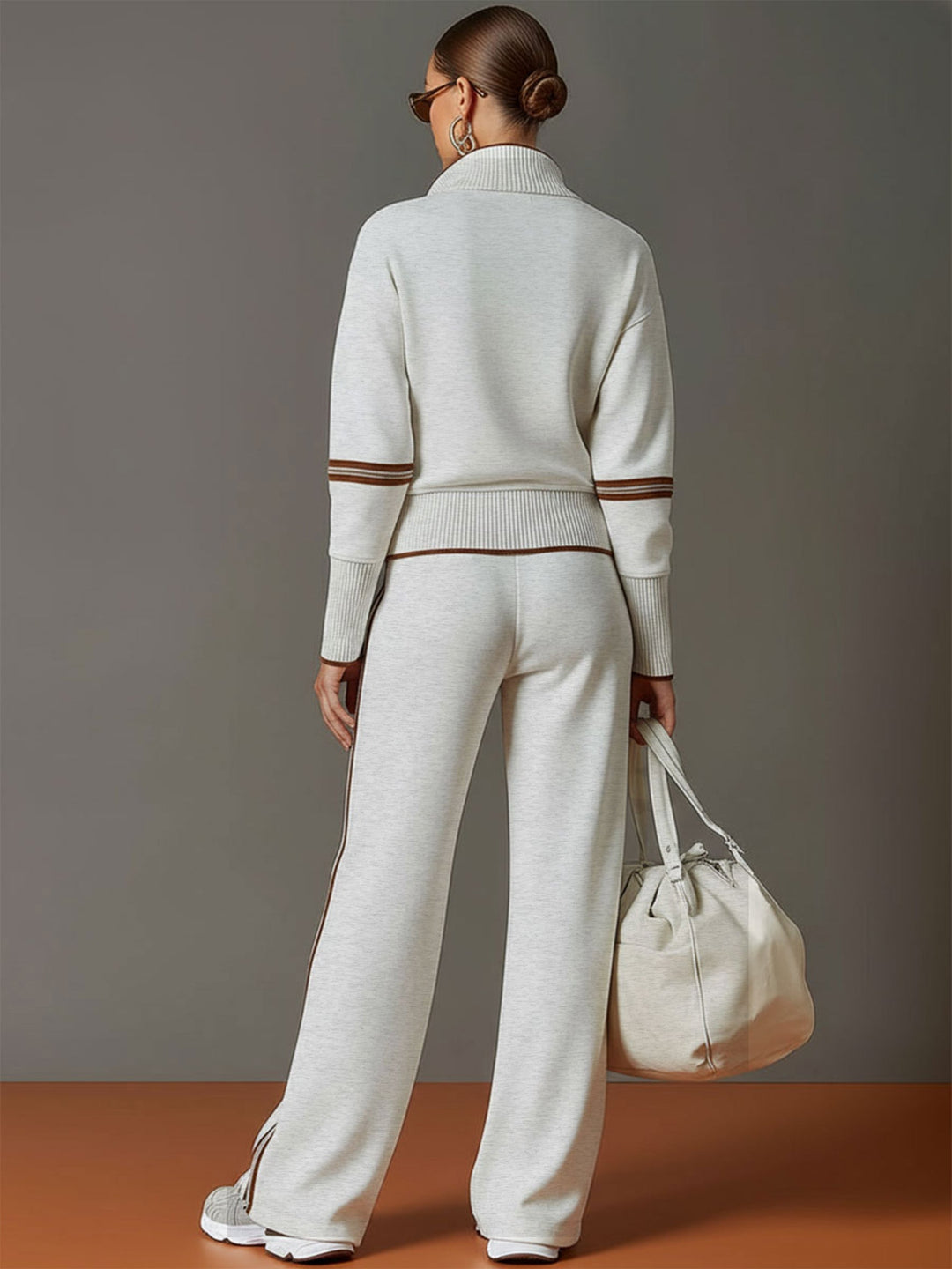 Chic women's half-zip sweatshirt & wide-leg trouser co-ord, perfect for effortless everyday style.