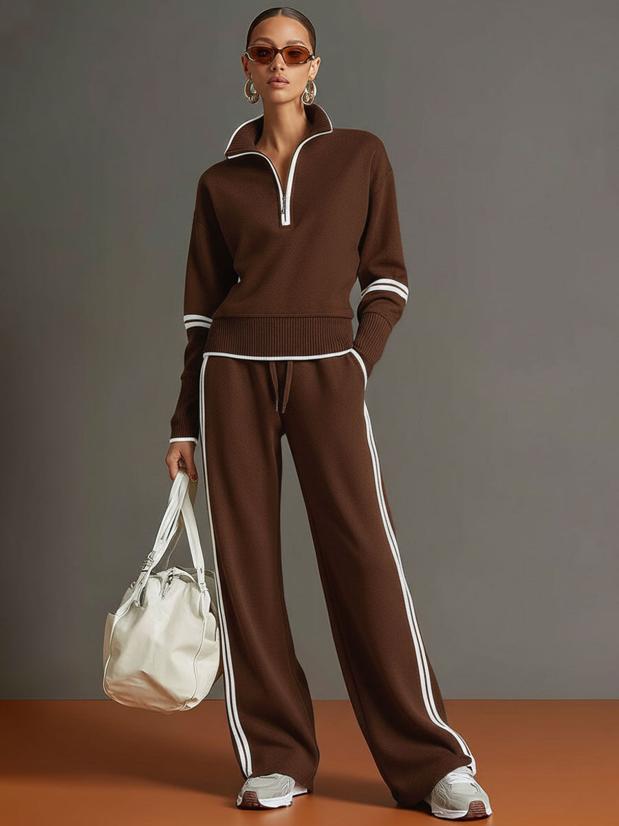 Woman in a relaxed half-zip sweatshirt & wide-leg trouser co-ord set, embodying comfortable style.