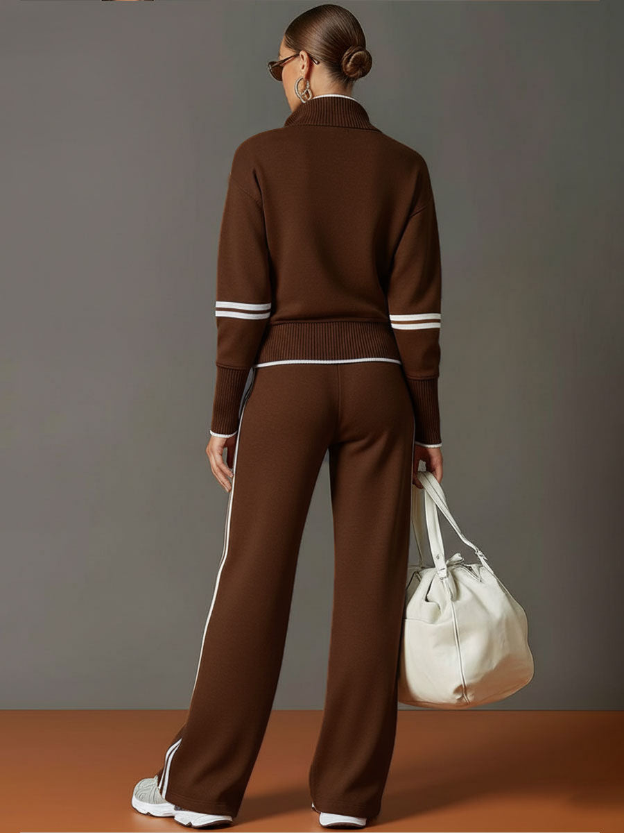 Model wearing a stylish two-piece set: half-zip top & wide-leg pants, perfect for casual outings.