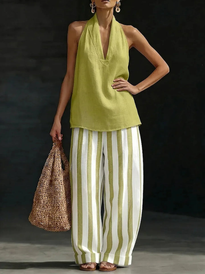 Women's elegant halter and wide-leg pant matching set. Comfortable two-piece outfit for summer casual style.