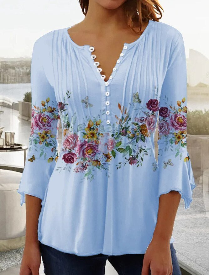 Feminine women's blouse with button front Henley style and intricate lace long sleeves.