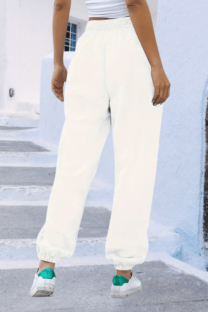 Black comfortable women's joggers, high-rise, elastic waist, perfect for loungewear.