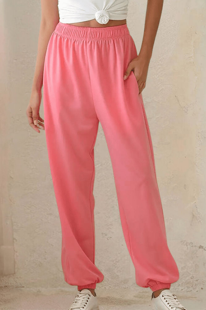 Close-up of elastic waist on women's comfortable high-rise joggers, showcasing detail.