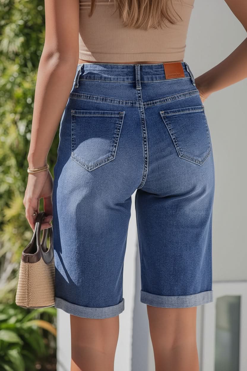 Chic women's high-rise long shorts, perfect for versatile summer fashion & relaxed everyday style.