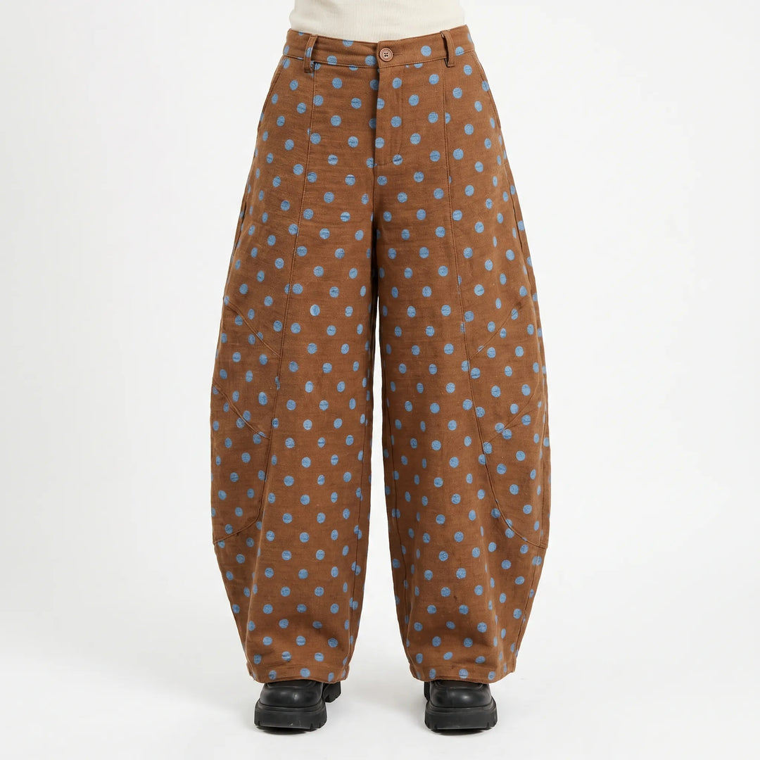 Chic women's wide barrel-leg pants with polka dots. High-rise, adjustable hem, perfect for streetwear fashion.