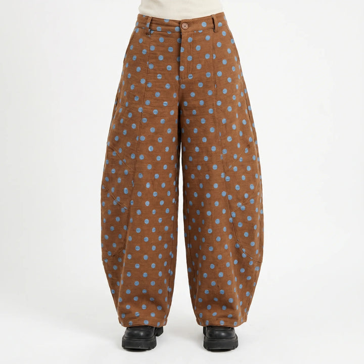 Chic women's wide barrel-leg pants with polka dots. High-rise, adjustable hem, perfect for streetwear fashion.