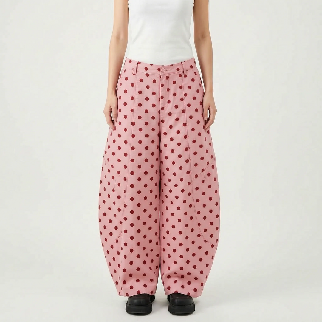 Comfortable women's polka dot wide barrel-leg pants with adjustable hem. Versatile for casual summer wear.