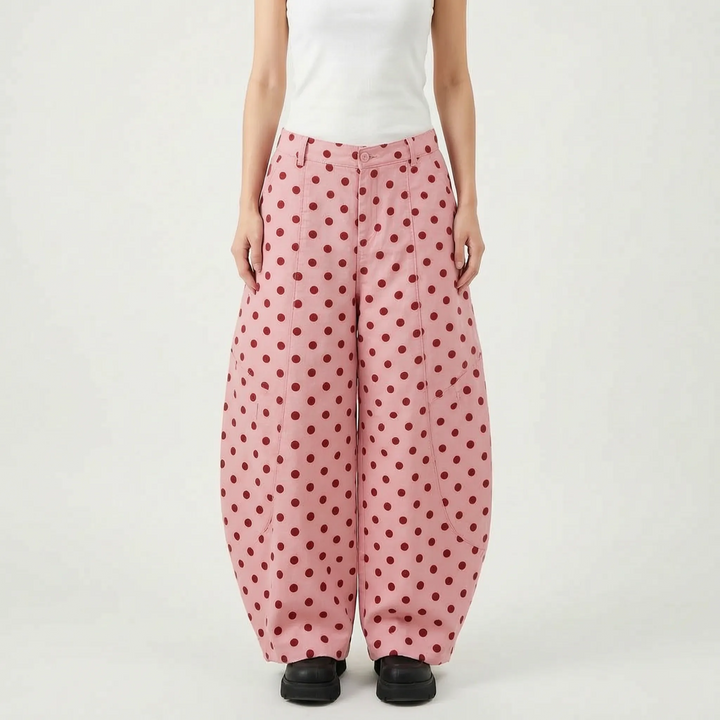 Comfortable women's polka dot wide barrel-leg pants with adjustable hem. Versatile for casual summer wear.