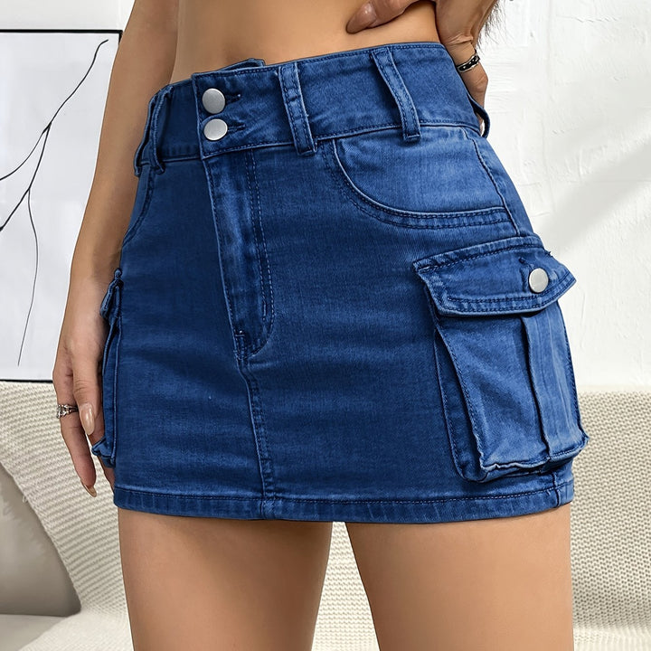 Detailed view of the fabric and cargo pockets on a stylish high waist mini skirt.