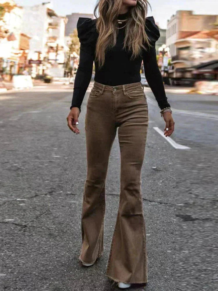 Essential women's high waist flare pants with pockets, a timeless staple for versatile work and casual fashion.