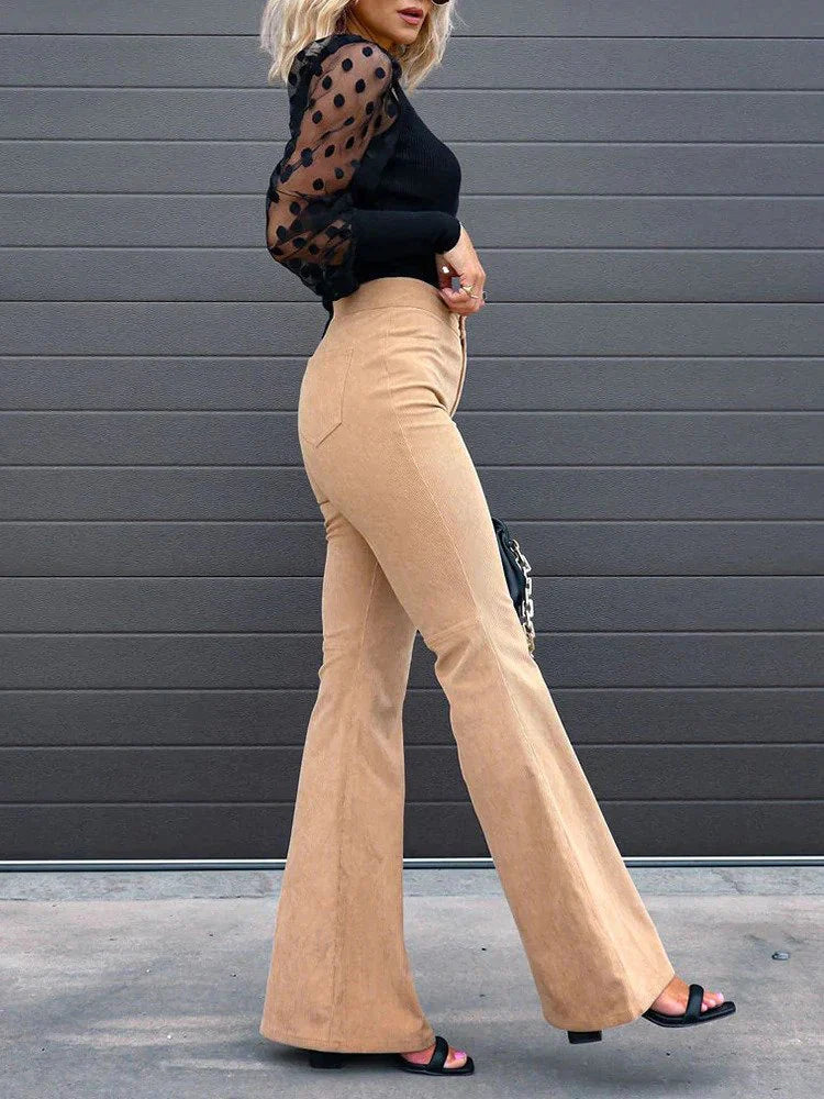 Full-length women's high waist flare pants, showcasing a trendy cut & convenient pockets for daily style.