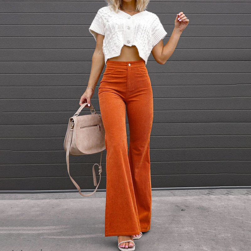 Full-length view of women's high-waist flared ribbed Kristin pants, showcasing retro style and comfort.