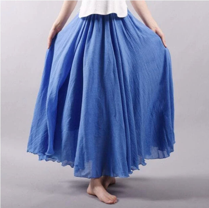 Women's high waist flowing A-line maxi skirt in boho chic style. Perfect for summer fashion & beachwear.