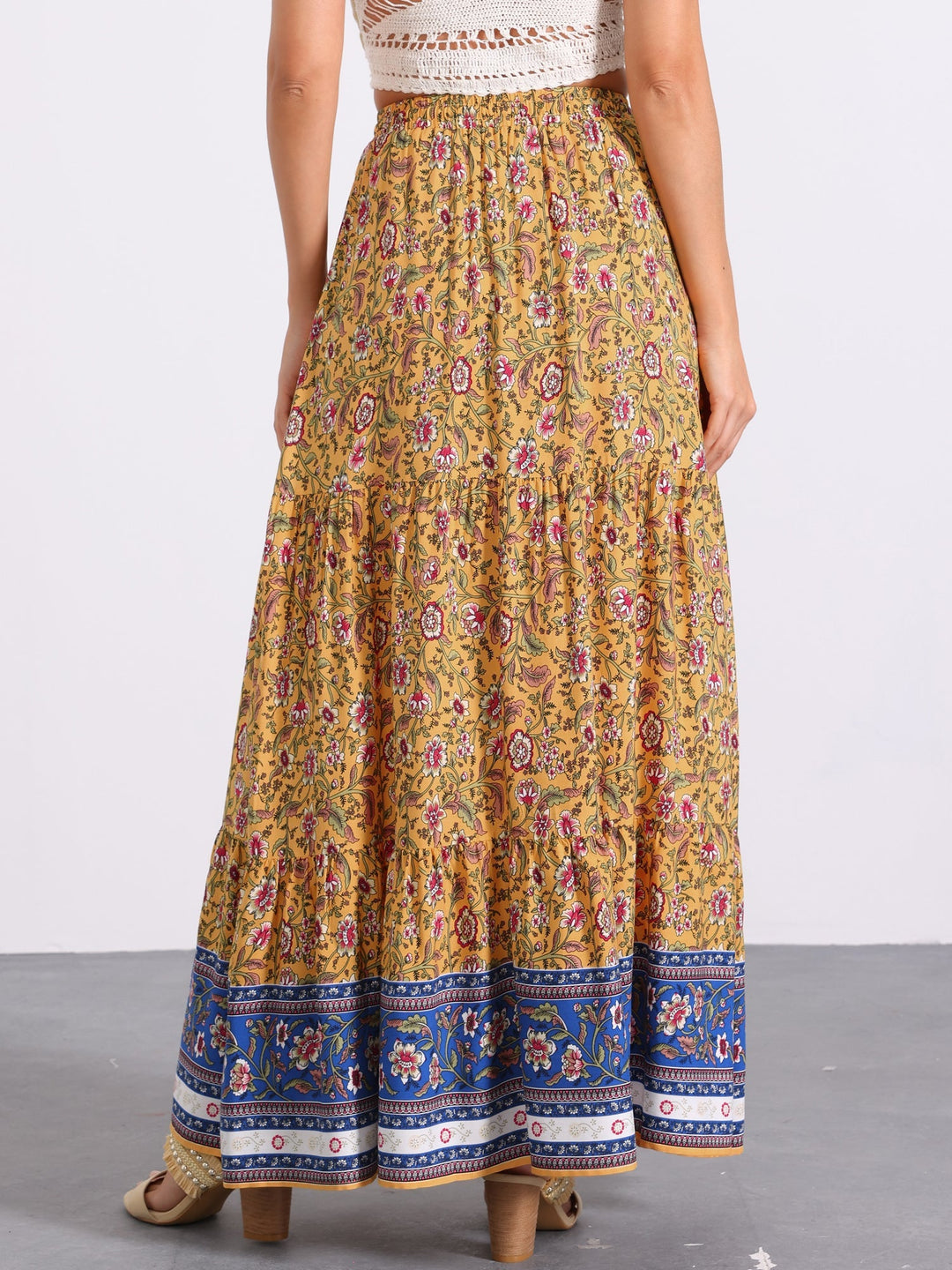 Versatile printed maxi skirt, women's high waist and flowing side slit for any occasion.