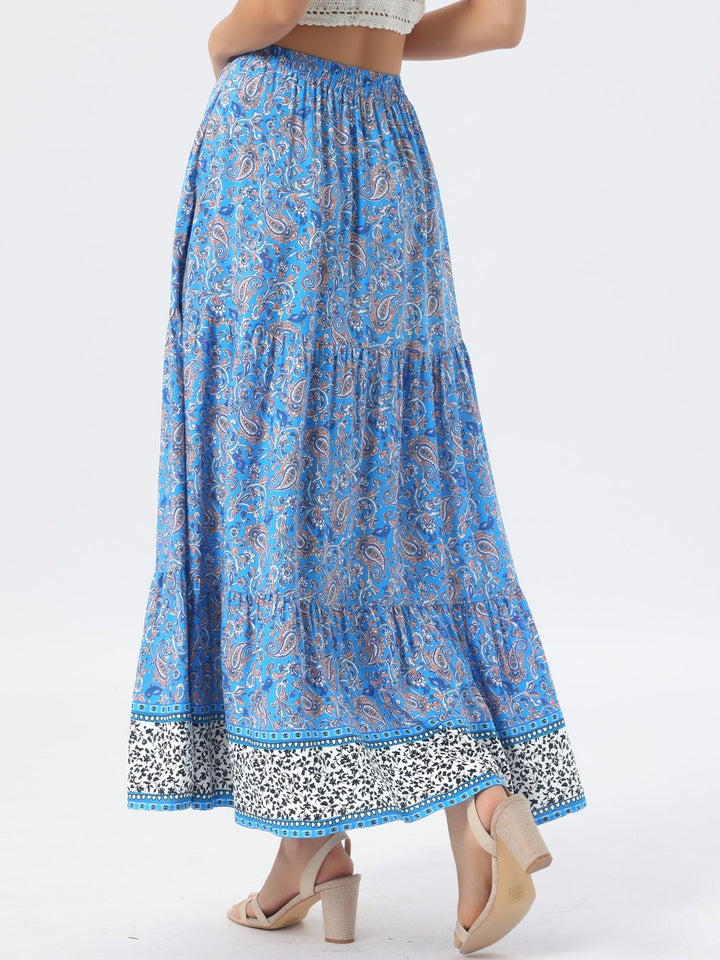 Festival high waist printed maxi skirt for women, flowing side slit for a boho vibe.