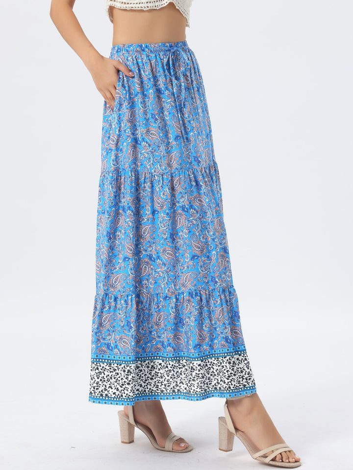 Women's high waist printed maxi skirt, flowing side slit for a captivating silhouette.