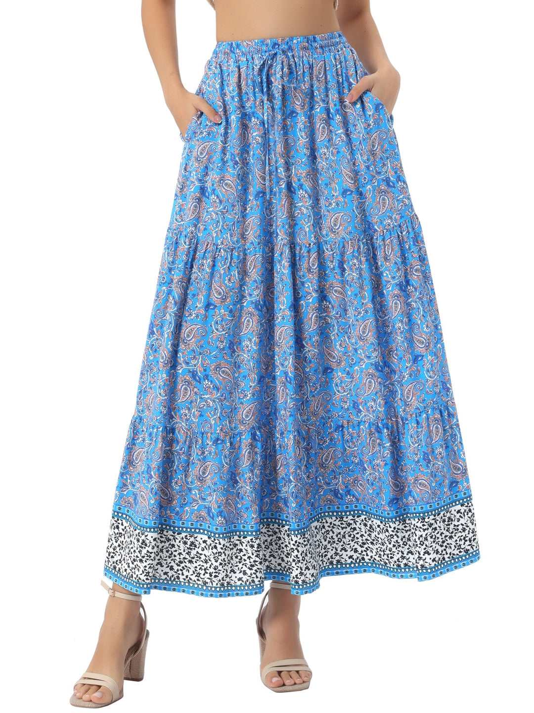 Versatile printed women's high waist maxi skirt, flowing side slit for adaptable fashion.